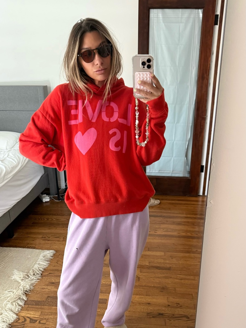 Red "Love Is" Graphic Hoodie - Women's Sweatshirt